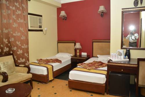 Фото Revels Plum Hotel