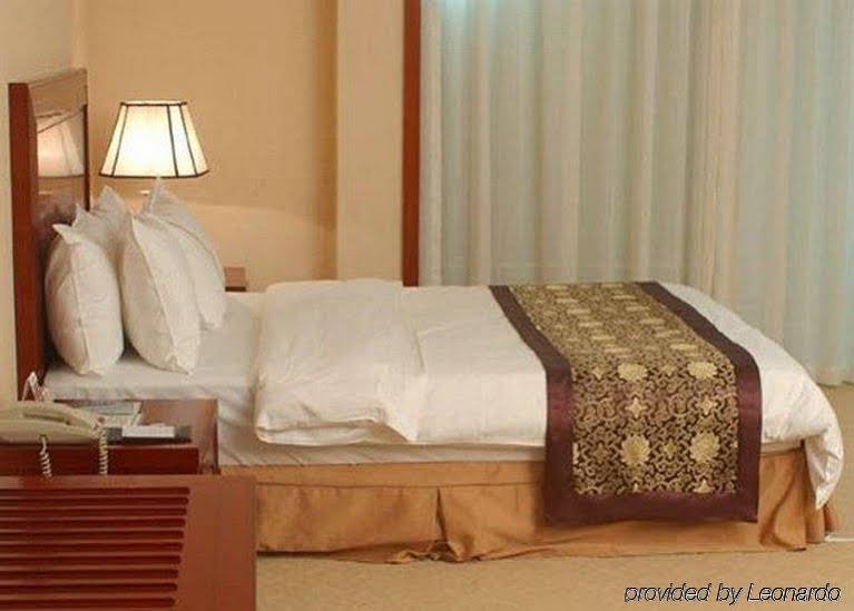 Фото Yashidu Suites Hotel