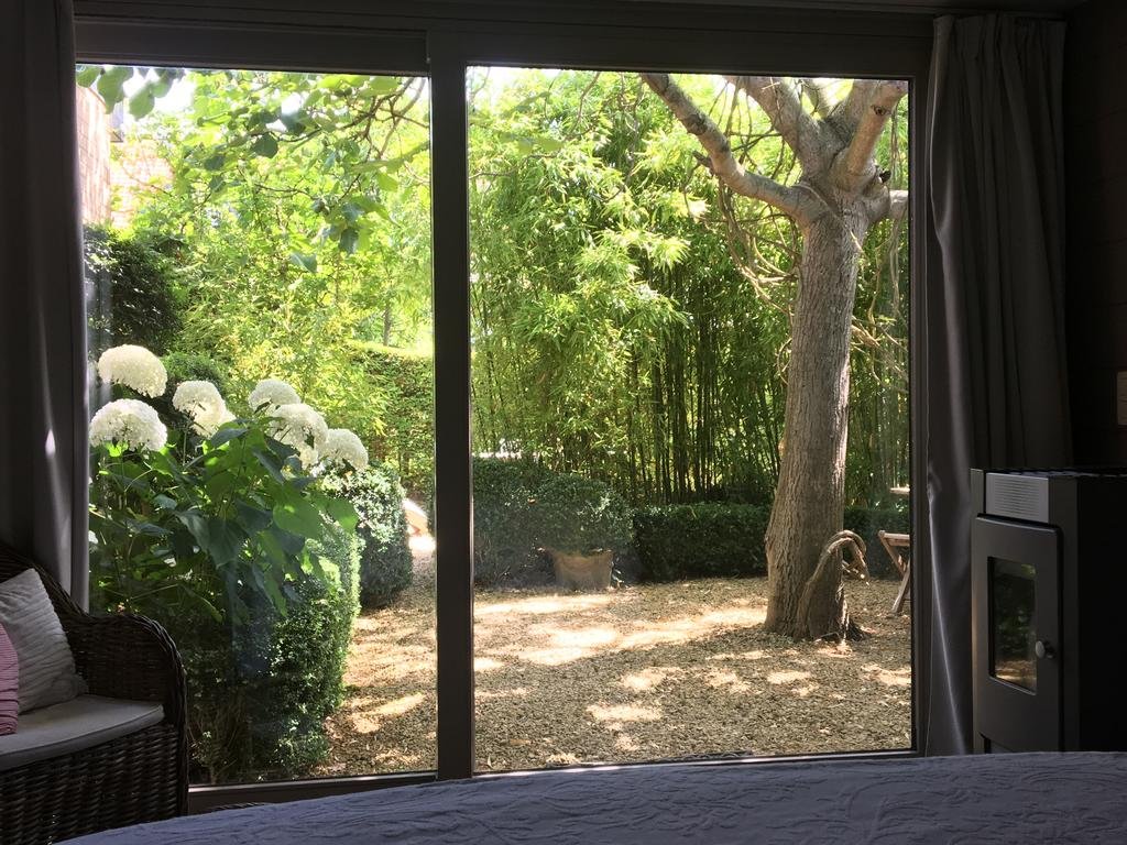 Фото B&b De Tuinkamer