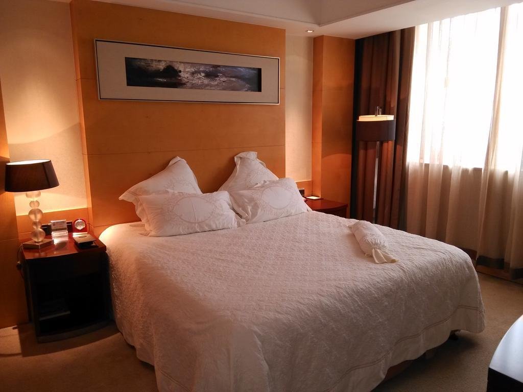 Фото Kunshan Yizui Crown Hotel