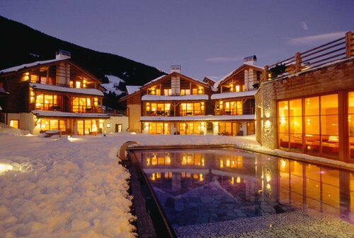 Внешний вид отеля Post Alpina - Family Mountain Chalets в Инничионе - Сан-Кандидо, фото 1