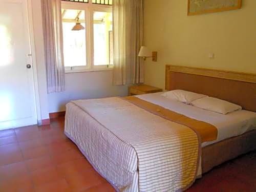 Фото Bali Lovina Beach Cottages