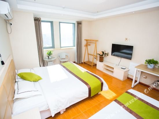 Фото Weihai You Gang Vacation ApartHotel