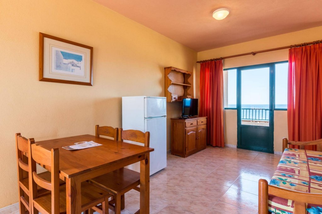 Фото Apartamentos Cabo de Baños by Mij