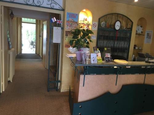 Фото Hôtel Le Lion D'Or