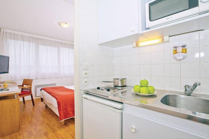 Фото Séjours and Affaires Lyon Saint Nicolas