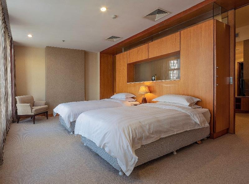 Фото Dalian Asia Pacific Service Apartment