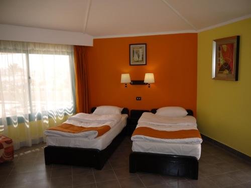 Фото Coral Garden Beach Resort