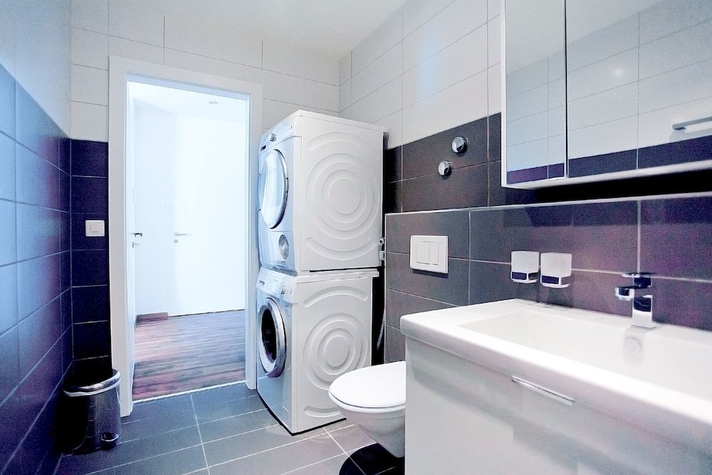 Фото Luxury Apartments by Livingdowntown