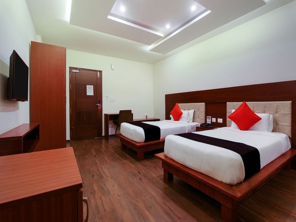 Фото Capital O 11903 Southern Hotels