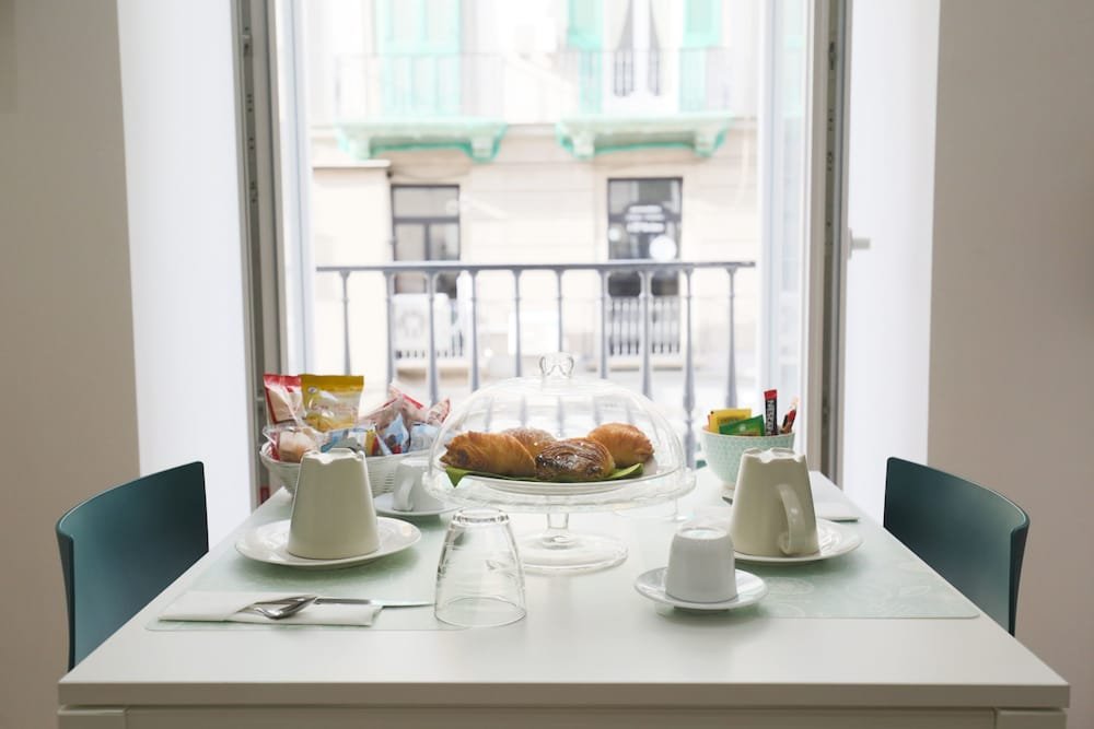 Фото Musto Suites & Rooms