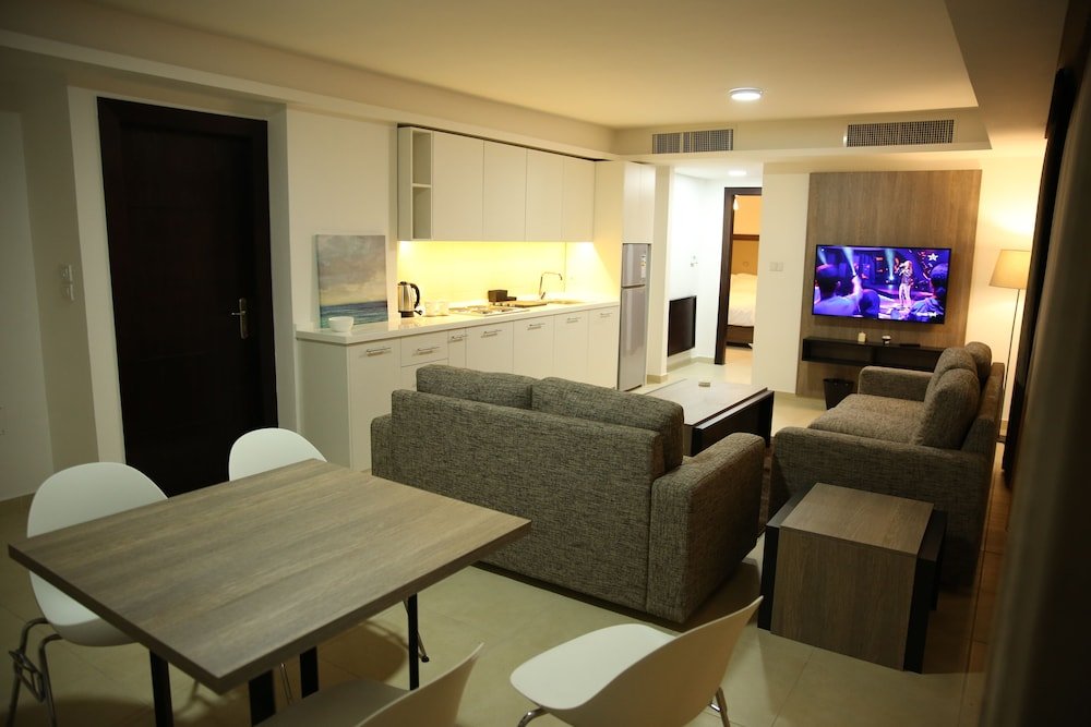 Фото Triple A Hotel Apartments