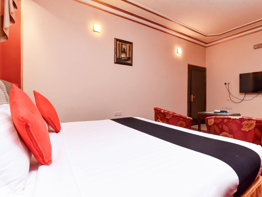 Фото Capital O456 Almansour Grand Hotel