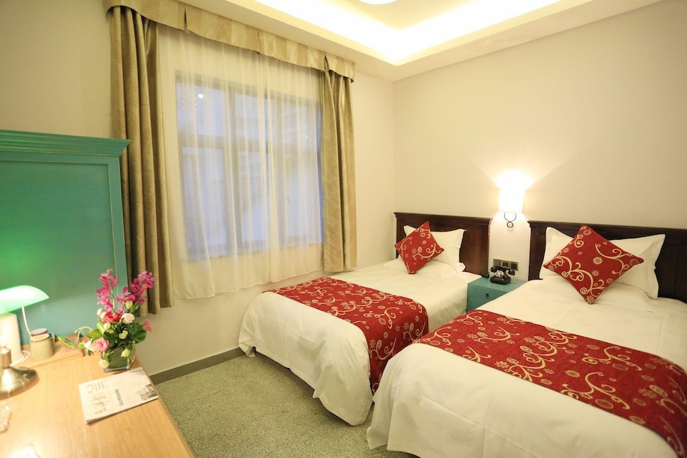 Фото Wuyang Boutique Hotel - Hefang Street