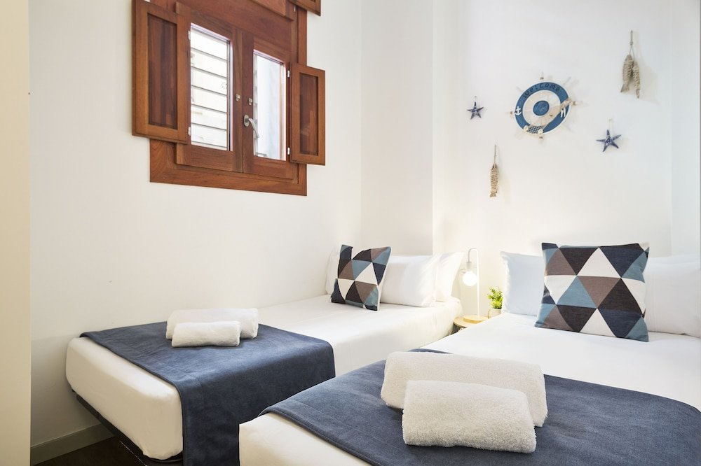 Фото Uma Suites Barceloneta Beach