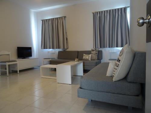 Фото Cosmos Apartments