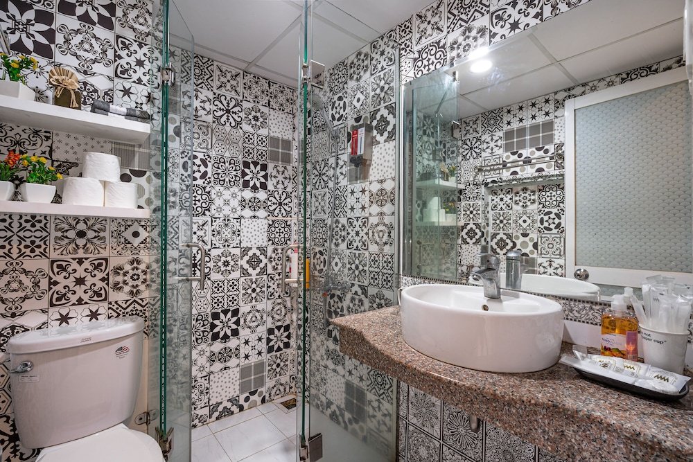 Фото Winsuites Saigon Hotel