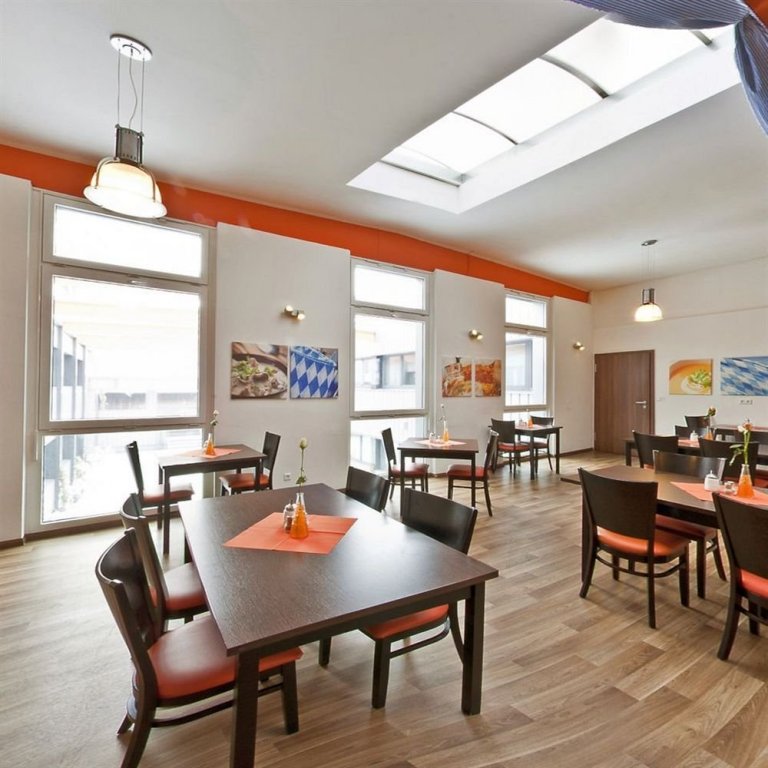 Фото Orange Hotel und Apartments