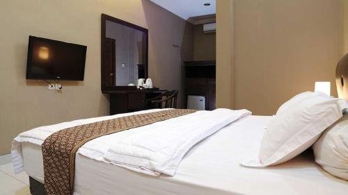 Фото Omah Semar Homestay