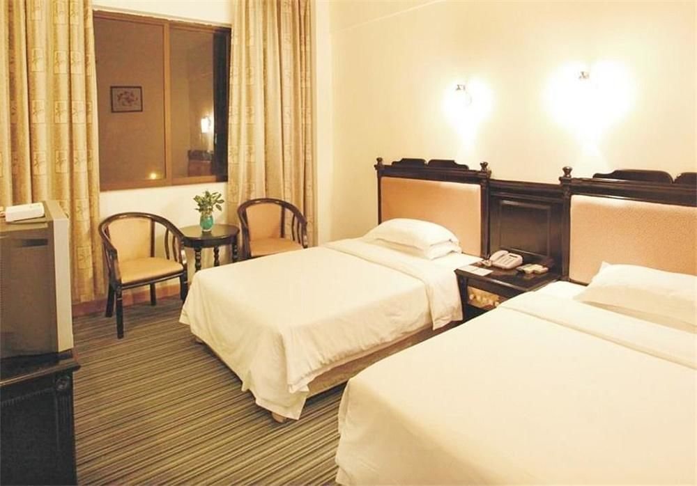 Фото Tengda Businss Hotel - Zhuhai