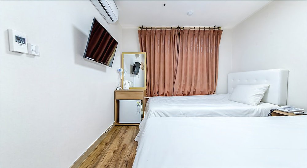 Фото Jeju Skyhill Business Hotel