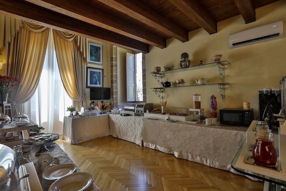 Фото Castello Castriota Scanderbeg Suites De Charme