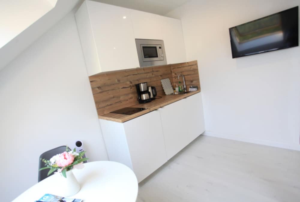 Фото Zollikof Aparts - Sauna & Studioapartments