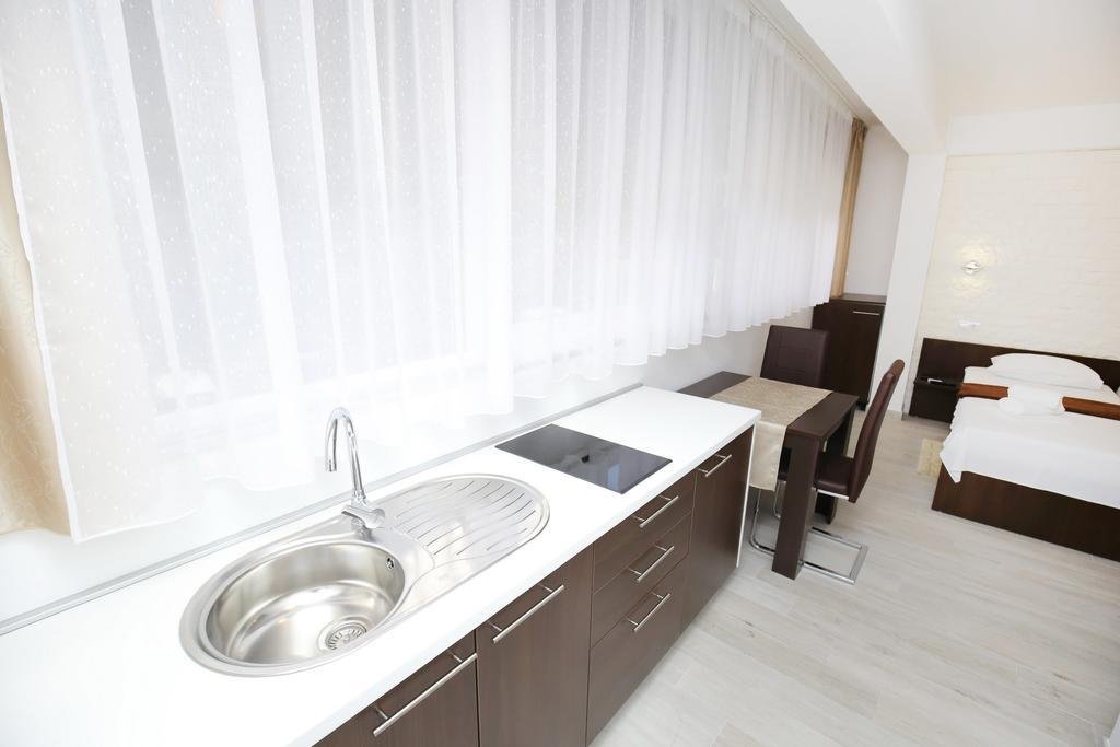 Фото Deluxe Mkc Apartments