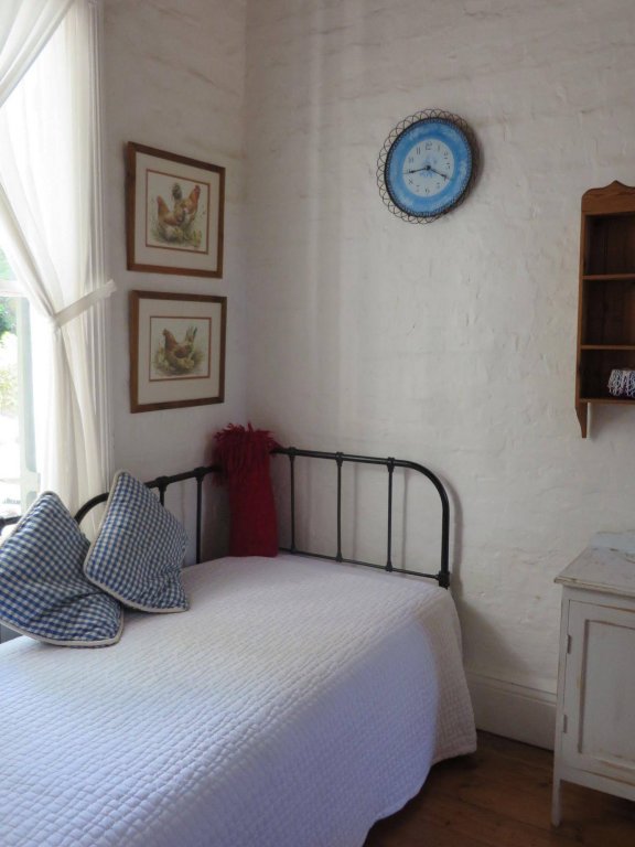 Фото Buiten Verwagten Guest House