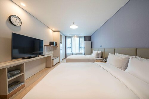 Гостиница SureStay Plus Hotel by Best Western Asan