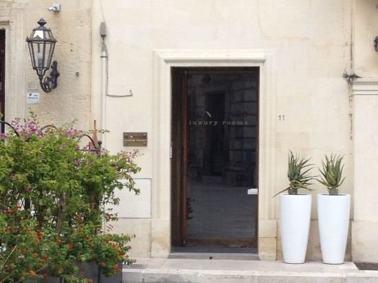 Фото Santacroce Luxury Rooms