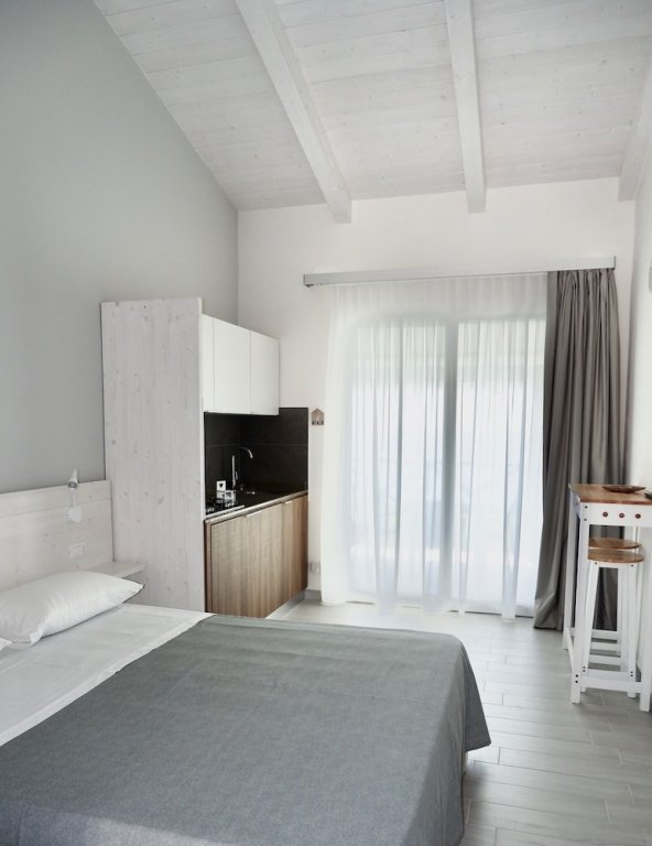 Фото Midenza Suites & Residence