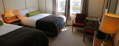 Гостиница Triple J Hotel & Cabins в Доусоне