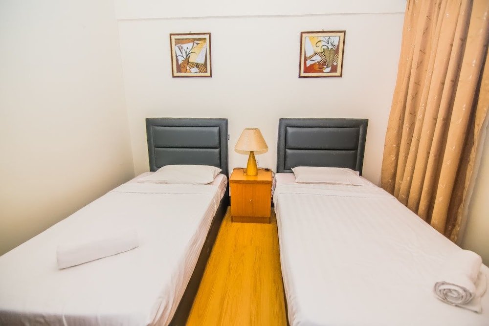 Фото Marina Travellers Suite Marina Court