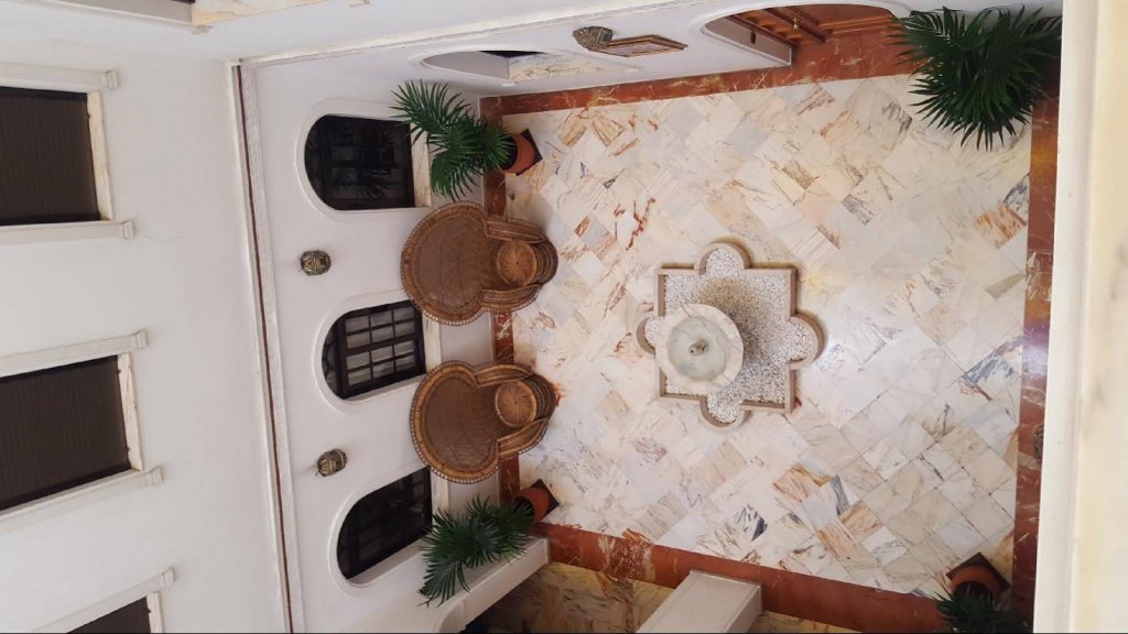 Фото Hotel y Apartamentos Doña Lola