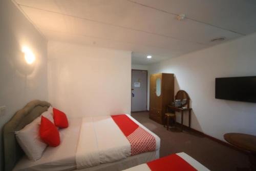 Фото Oyo 699 Plaza Hotel