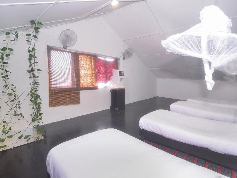 Фото Spot On 89929 Tropical Lodge