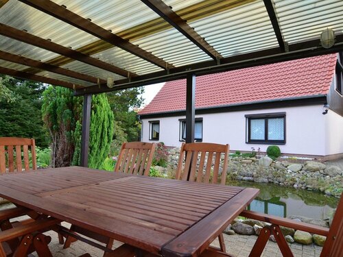 Гостиница Apartment in the Harz With a log Cabin, Pond and Covered Seating Area