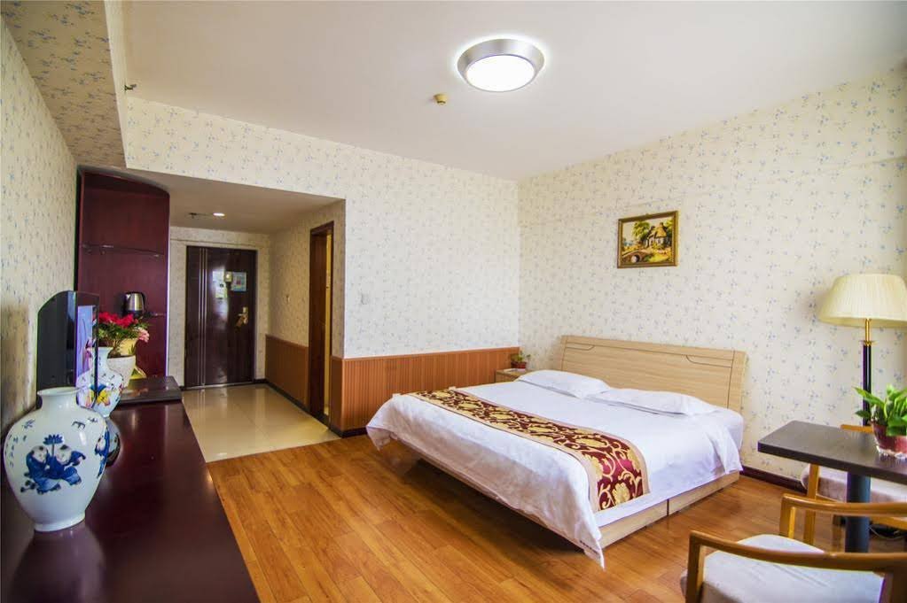 Фото Xian Golden Tree Business Hotel