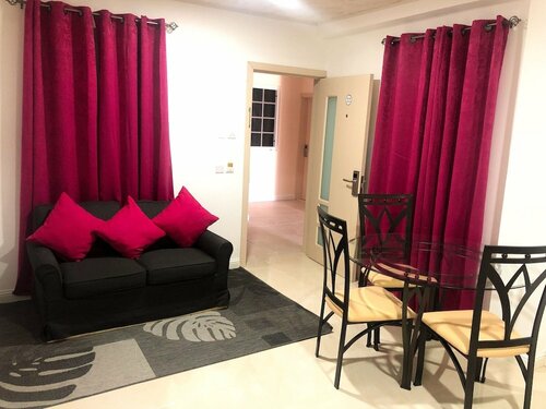 Апартаменты Calliandras Apartment Complex в Кингстауне