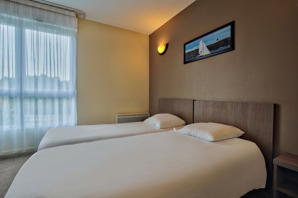 Фото Zenitude Hôtel - Résidences Magny les Hameaux