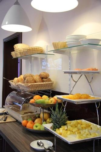 Фото Adena Hotel