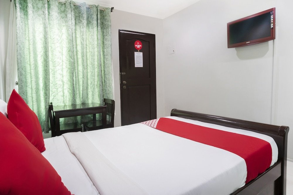 Фото Oyo 557 Samantha's Apartelle