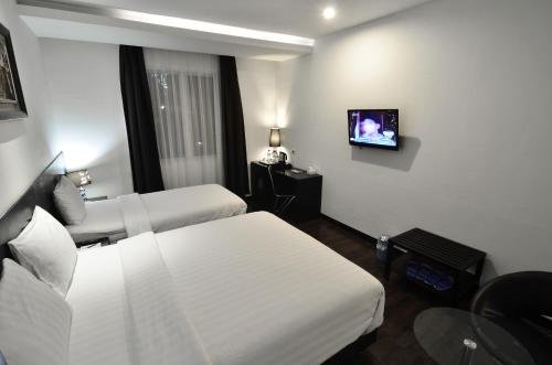 Фото Continent Centrepoint Hotel Makassar