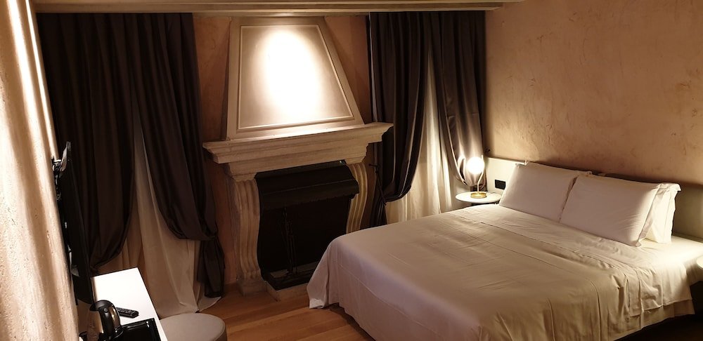 Фото Ca' dei Proverbi Suites