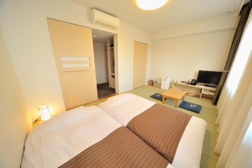 Фото Dormy Inn Kofu Natural Hot Spring