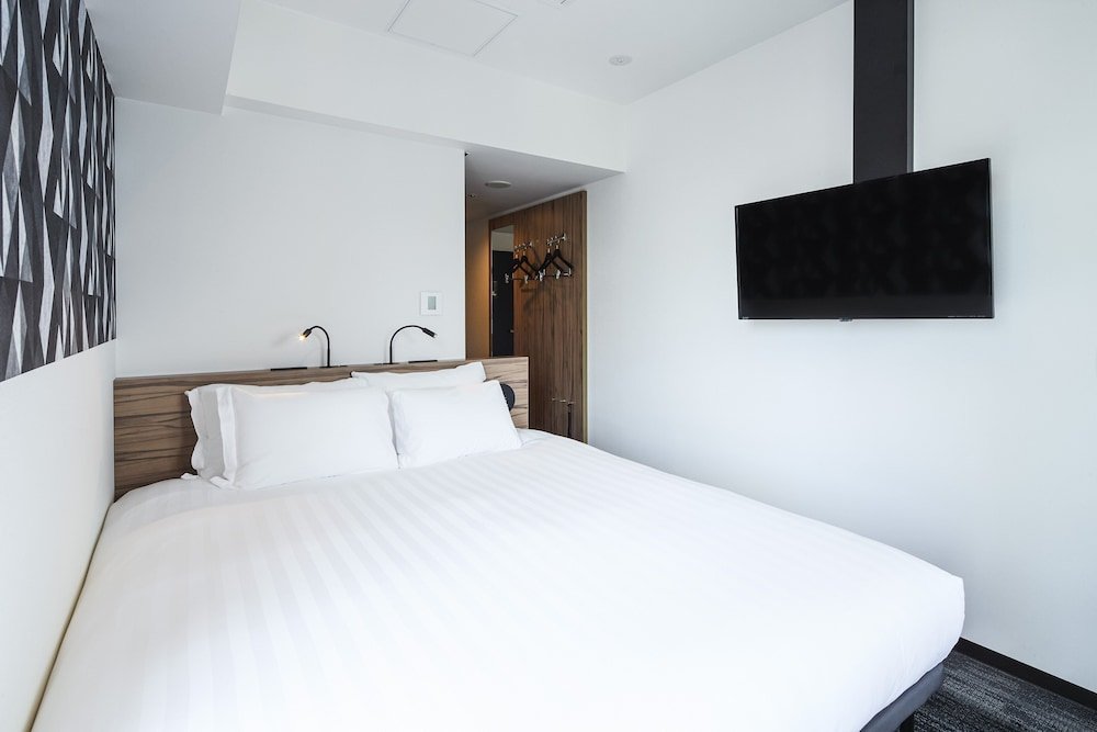 Фото Holiday Inn Express Osaka City Centre Midosuji