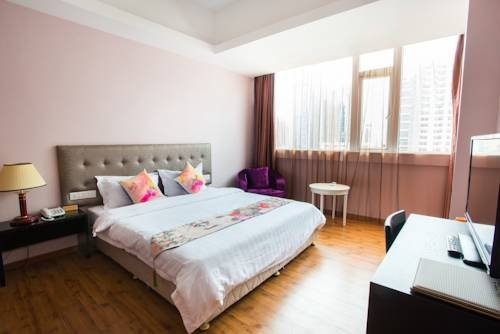 Фото Shenzhen New World Metro Grand Hotel