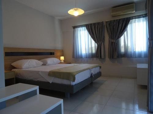 Фото Cosmos Apartments