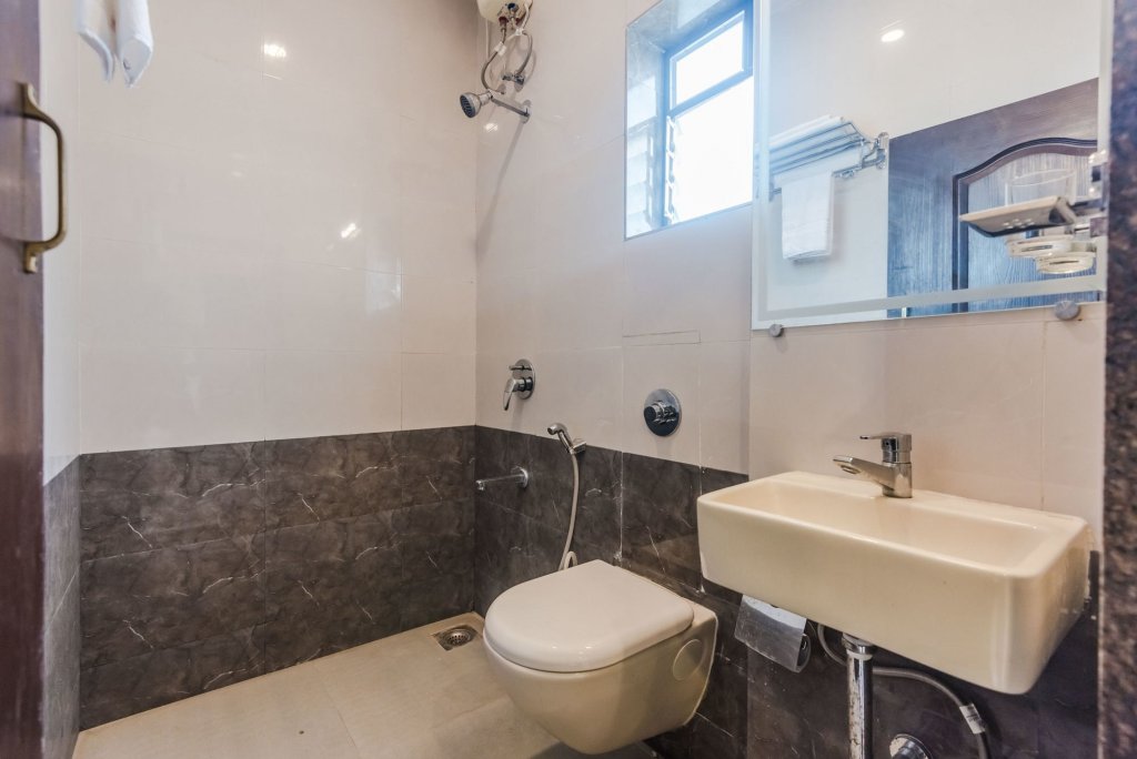 Фото Oyo 8373 Rigga Inn